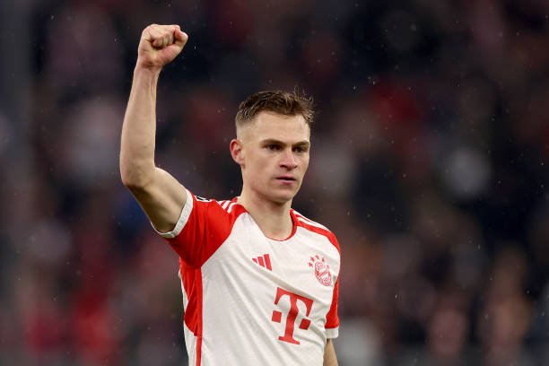 MUNICH, GERMANY - MARCH 05: Joshua Kimmich of FC Bayern München celebrates victory after winning the UEFA Champions League 2023/24 round of 16 second leg match between FC Bayern München and SS Lazio at Allianz Arena on March 05, 2024 in Munich, Germany. (Photo by Alexander Hassenstein/Getty Images)