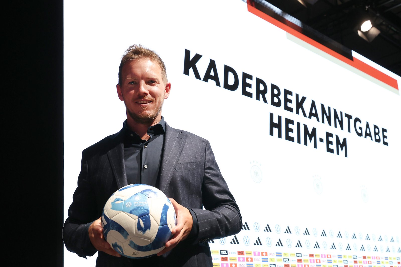 BERLIN, GERMANY - MAY 16: Julian Nagelsmann, head coach of Team Germany attends the squad unveiling of the German National Football team for the Euro 2024 at DRIVE. Volkswagen Group Forum on May 16, 2024 in Berlin, Germany. (Photo by Alexander Hassenstein/Getty Images)