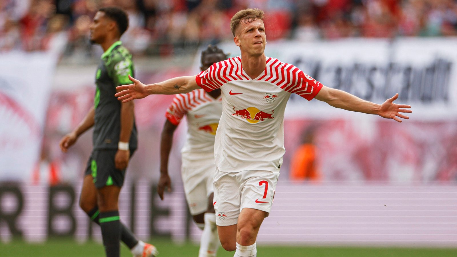 Leipzig's Spanish forward #07 Dani Olmo celebrates his 1-0 during the German first division Bundesliga football match RB Leipzig v VfL Wolfsburg in Leipzig, eastern Germany on April 13, 2024. (Photo by Odd ANDERSEN / AFP) / DFL REGULATIONS PROHIBIT ANY USE OF PHOTOGRAPHS AS IMAGE SEQUENCES AND/OR QUASI-VIDEO (Photo by ODD ANDERSEN/AFP via Getty Images)