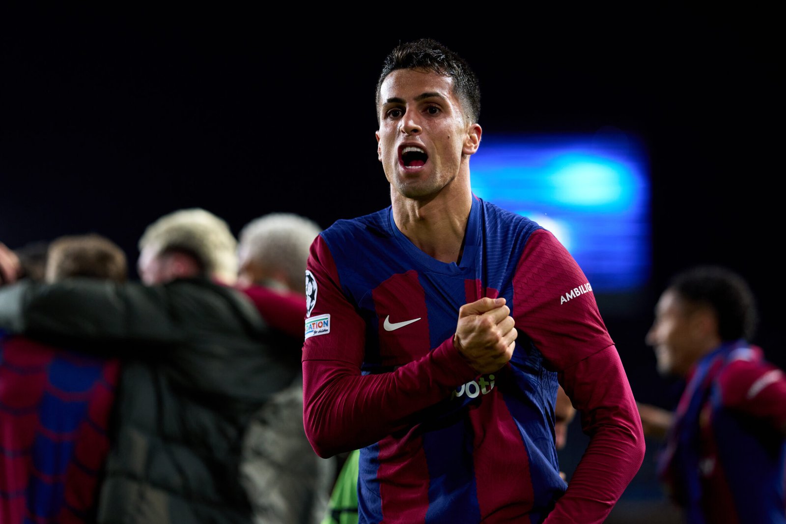 BARCELONA, SPAIN - MARCH 12: Joao Cancelo of FC Barcelona celebrates after his teammate Robert Lewandowski scored their team's third goal during the UEFA Champions League 2023/24 round of 16 second leg match between FC Barcelona and SSC Napoli at Estadi Olimpic Lluis Companys on March 12, 2024 in Barcelona, Spain. (Photo by Alex Caparros/Getty Images) (Photo by Alex Caparros/Getty Images)