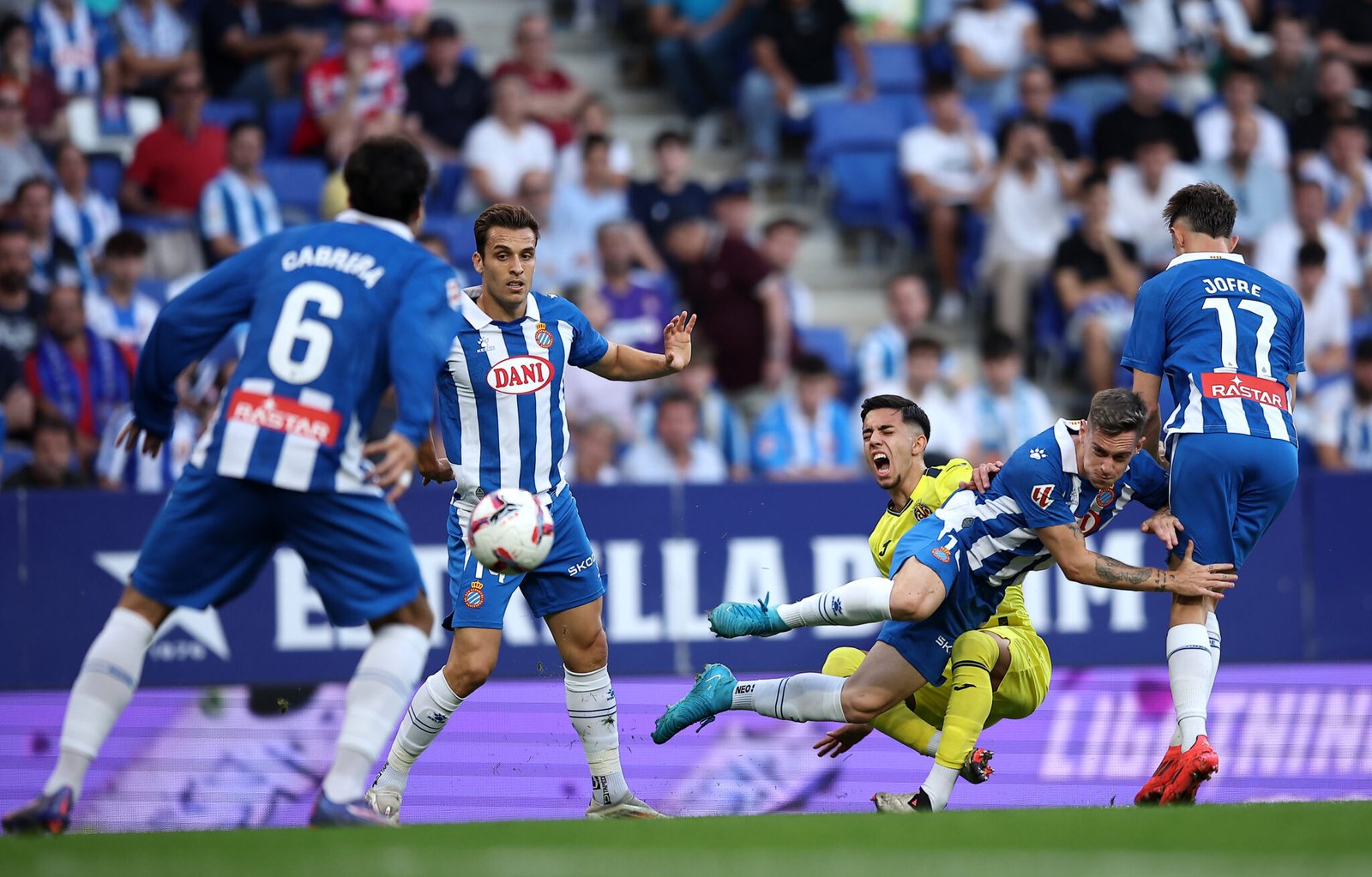 BARCELONA, SPAIN - SEPTEMBER 26: Ilias Akhomach of Villarreal CF clashes with Pol Lozano of RCD Espanyol during the LaLiga match between RCD Espanyol de Barcelona and Villarreal CF at RCDE Stadium on September 26, 2024 in Barcelona, Spain. (Photo by Eric Alonso/Getty Images)