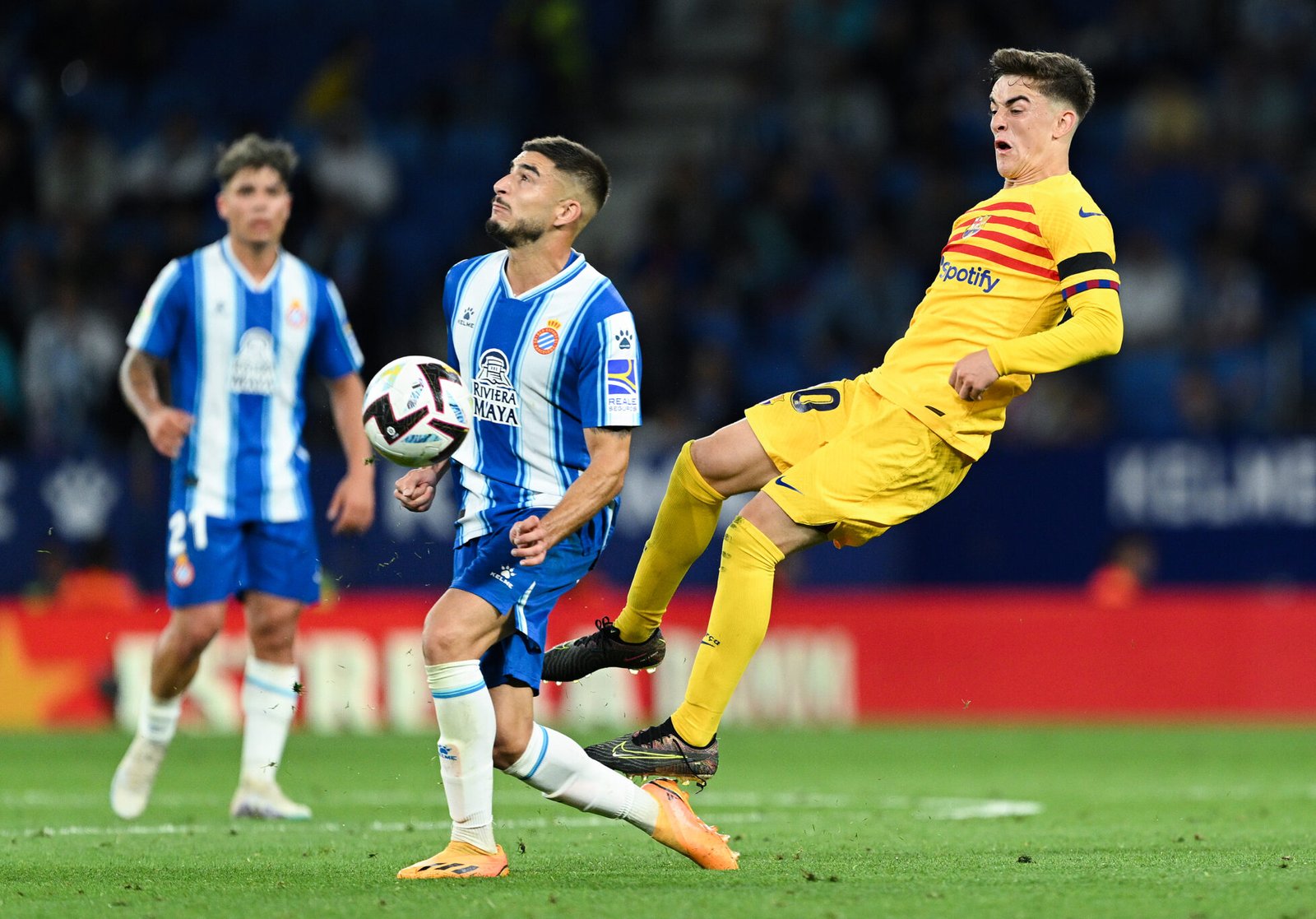 BARCELONA, SPAIN - MAY 14: Oscar Gil of RCD Espanyol competes for the ball with Gavi of FC Barcelona during the LaLiga Santander match between RCD Espanyol and FC Barcelona at RCDE Stadium on May 14, 2023 in Barcelona, Spain. (Photo by David Ramos/Getty Images)