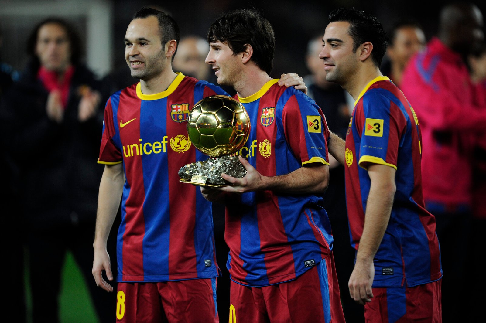 Iniesta, Messi y Xavi