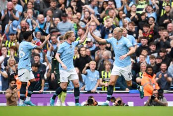 MANCHESTER, ENGLAND - SEPTEMBER 14: Erling Haaland of Manchester City celebrates scoring his team's first goal with team mate Kevin De Bruyne of Manchester City during the Premier League match between Manchester City FC and Brentford FC at Etihad Stadium on September 14, 2024 in Manchester, England. (Photo by Stu Forster/Getty Images)