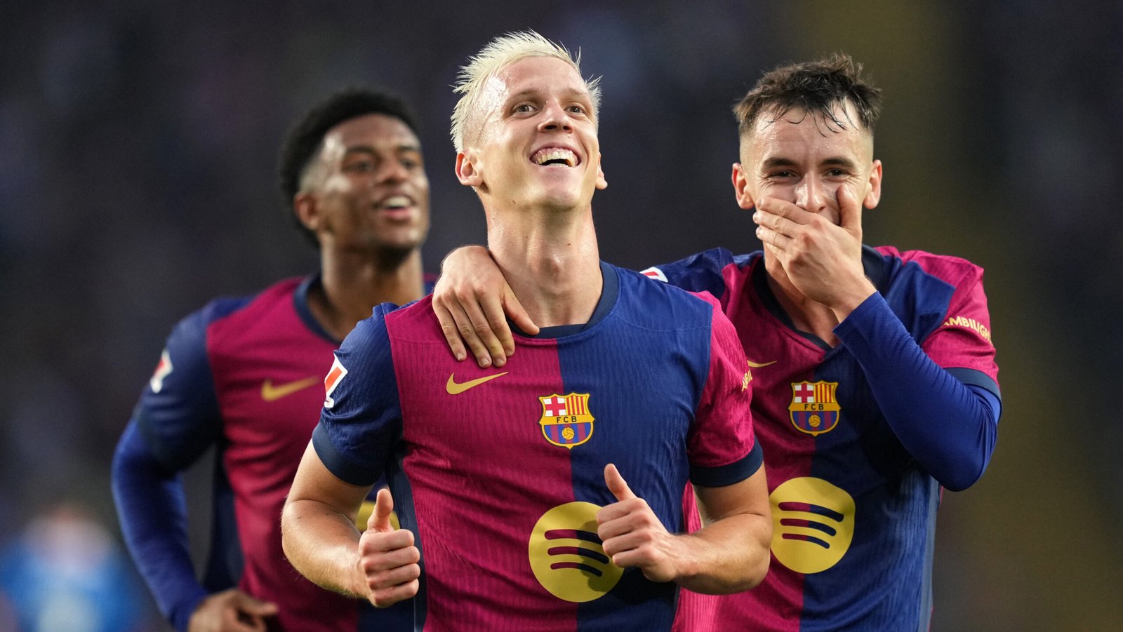 BARCELONA, SPAIN - NOVEMBER 03: Dani Olmo of FC Barcelona celebrates scoring his team's third goal with teammate Marc Casado during the La Liga EA Sports match between FC Barcelona and RCD Espanyol at Estadi Olimpic Lluis Companys on November 03, 2024 in Barcelona, Spain. (Photo by Alex Caparros/Getty Images)