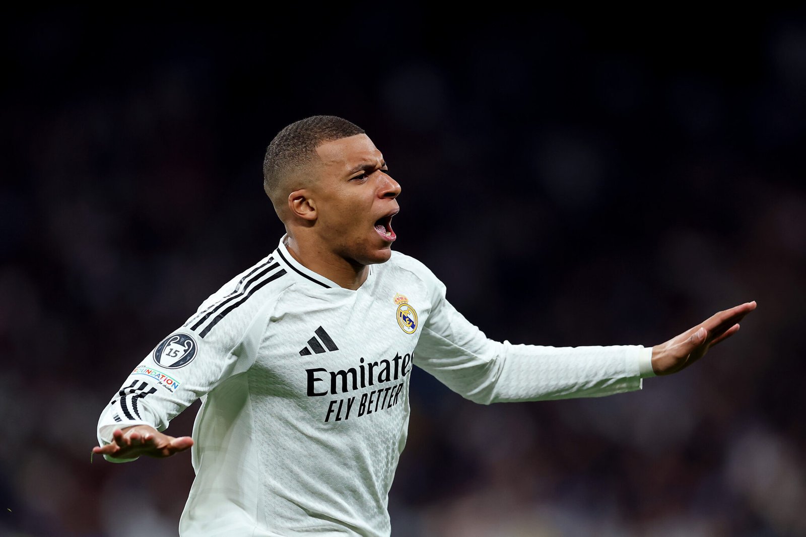 MADRID, SPAIN - FEBRUARY 19: Kylian Mbappe of Real Madrid celebrates scoring his team's first goal during the UEFA Champions League 2024/25 League Knockout Play-off second leg match between Real Madrid C.F. and Manchester City at Santiago Bernabeu Stadium on February 19, 2025 in Madrid, Spain. (Photo by Clive Brunskill/Getty Images)